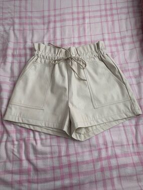 Pink leather shorts